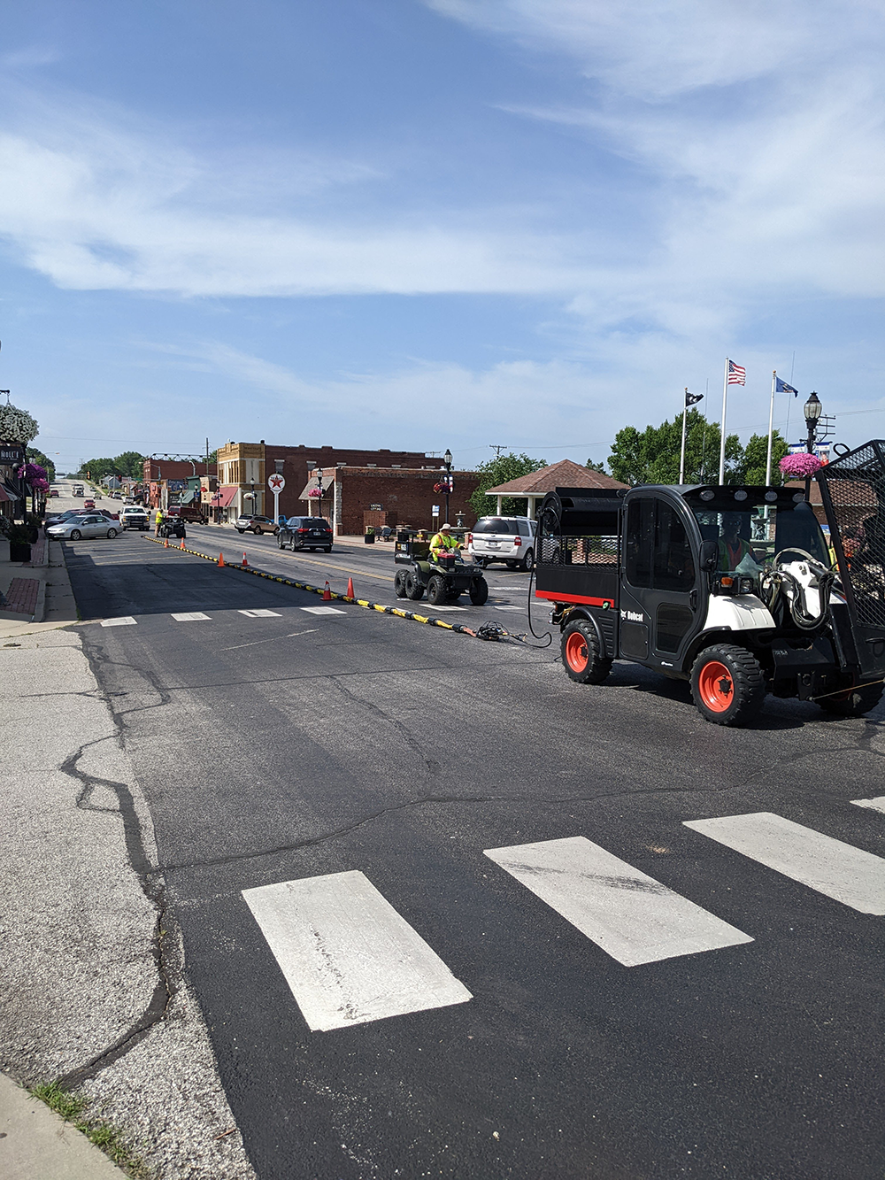 The KGS exploration crew collects seismic field data to learn more about subsurface risks in Kansas. Here, the crew works in Galena, where underground ore mine remnants present potential hazards.
